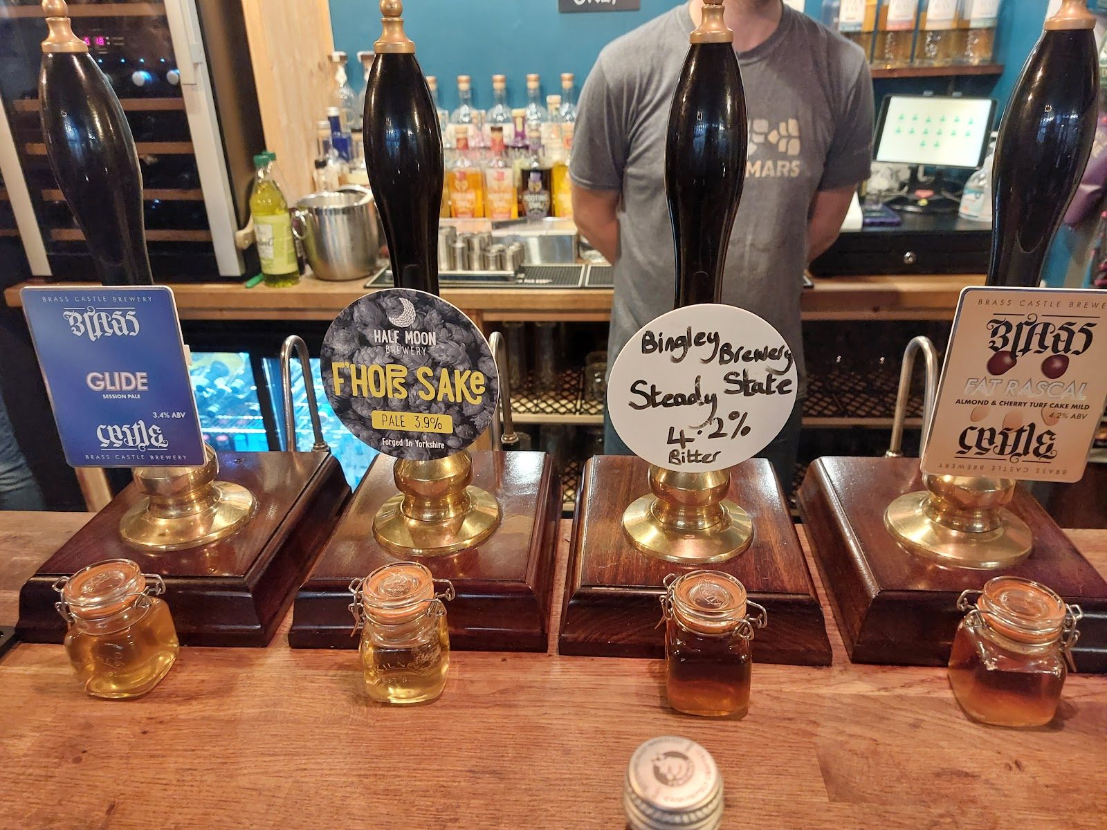Hand pumps on the bar at Arch & Abbey